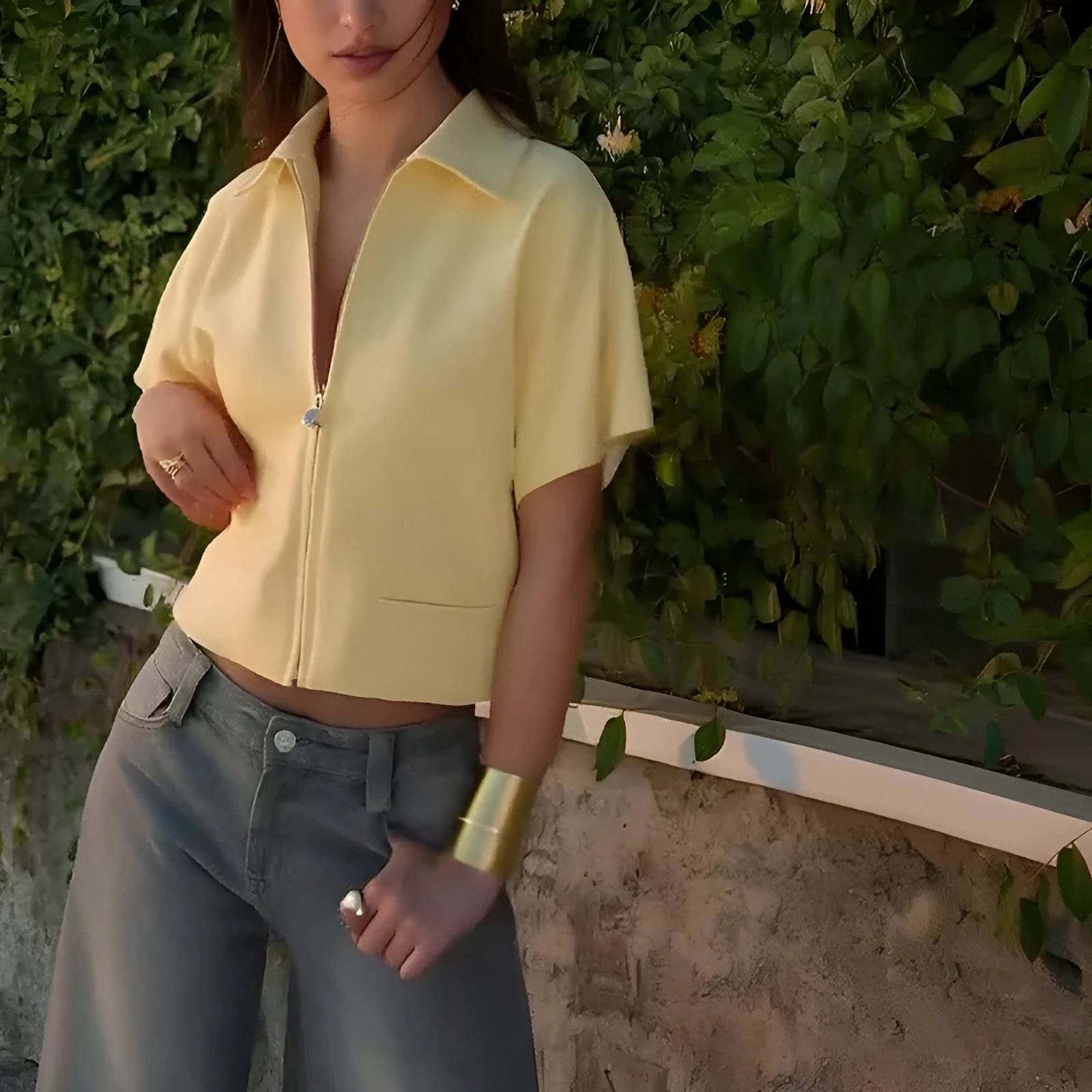 Loose fit short sleeve casual top in yellow, laid flat