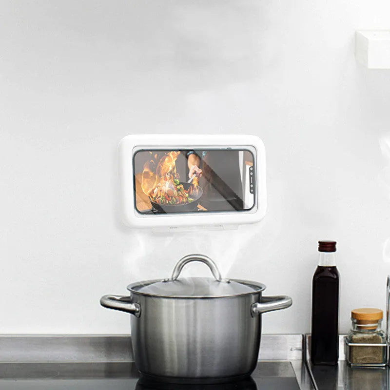 White waterproof phone holder mounted on bathroom tile showing smartphone inside with visible touchscreen