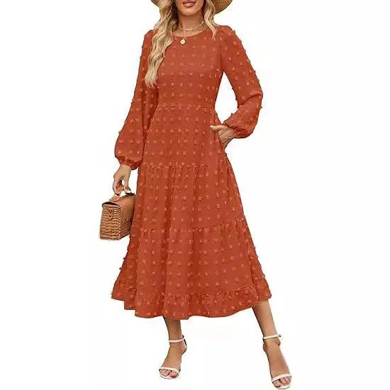 Women's beige long sleeve casual dress with ruffled sleeves and a high waist, shown on a hanger.