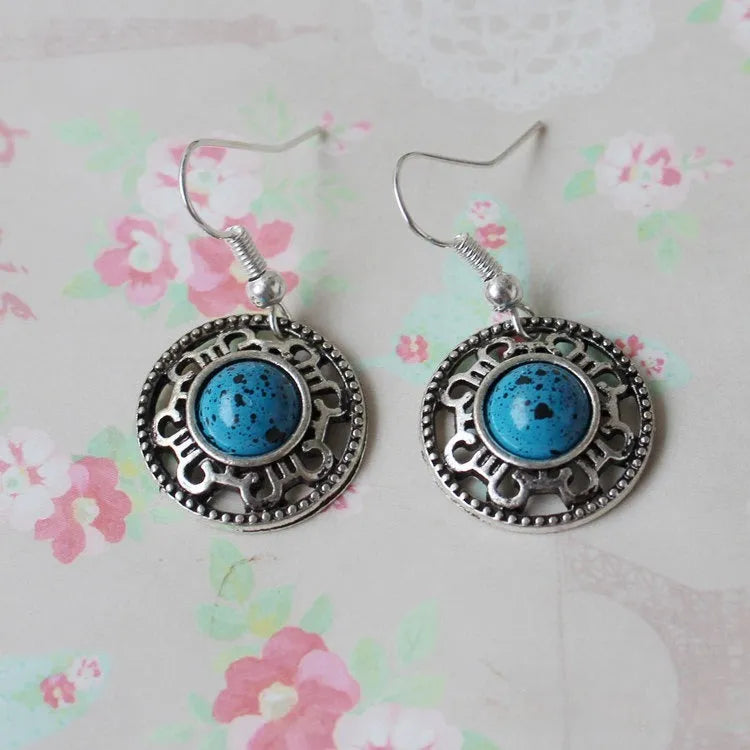 Miao silver retro turquoise flower disk earrings with geometric shape and ethnic patterns