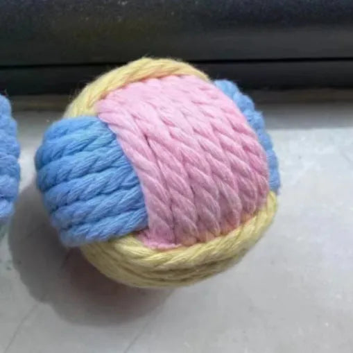 Handmade cotton cat plush hair ball toys in three colour options on white background