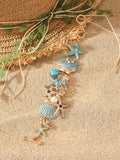 Women's alloy rhinestone bracelet with boat anchor, shell, and starfish charms in blue.