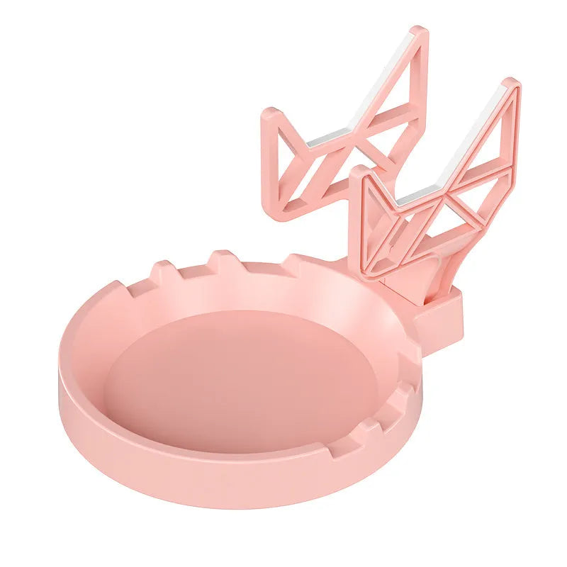 Universal game controller wall hanging rack in black, white, or pink colours with adhesive mounting options