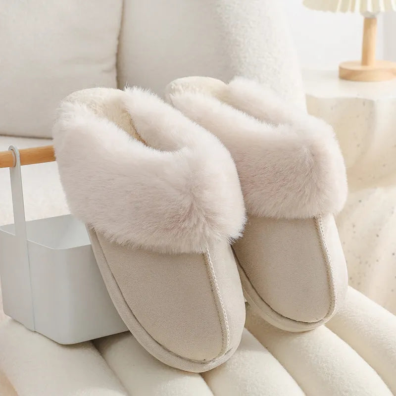 Women's winter plush slippers with round toe design in brown colour showing stitching detail