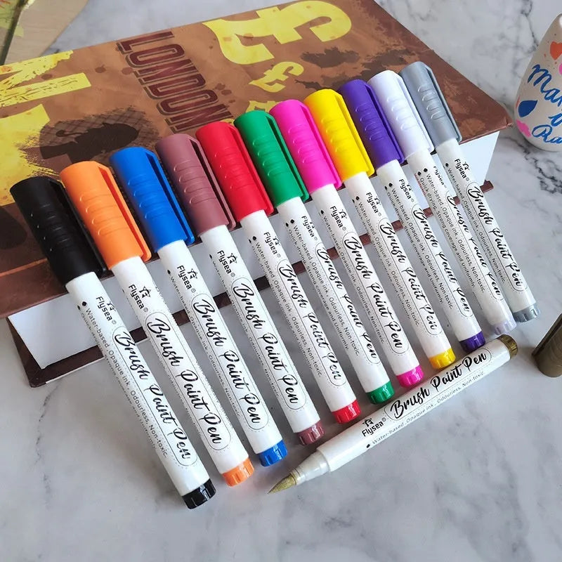 Set of soft head gouache pens with flexible tips for hand lettering and card art.