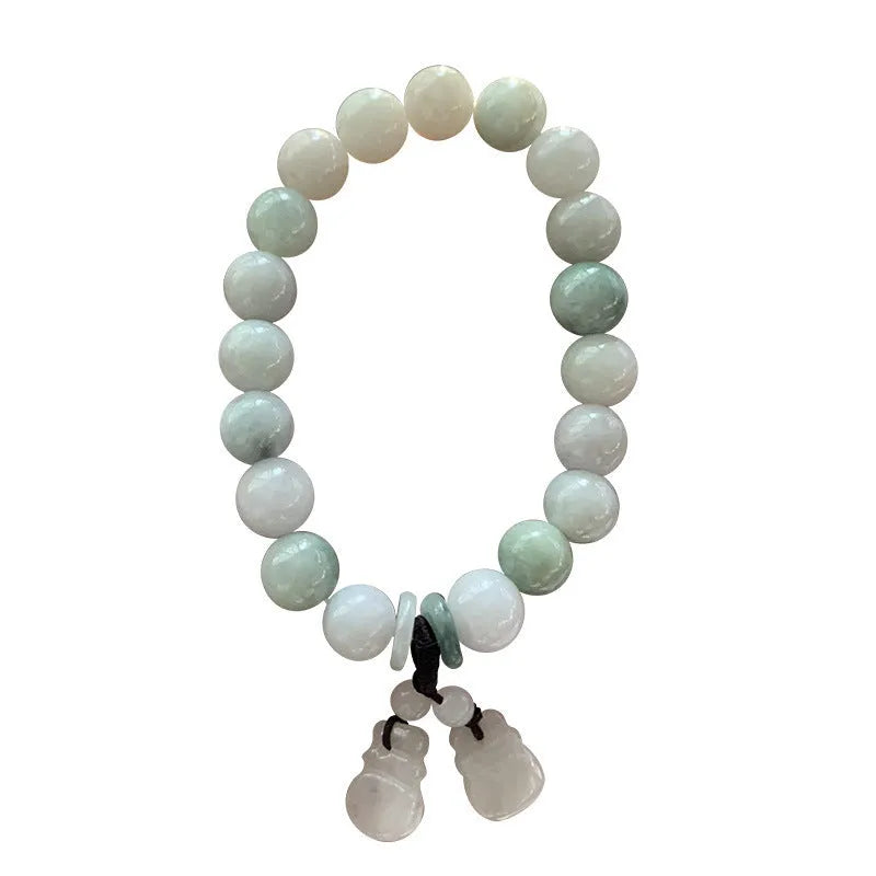 Natural emerald jade geometric bracelet with Maitreya Buddha, apple, and money bag hanging charms.