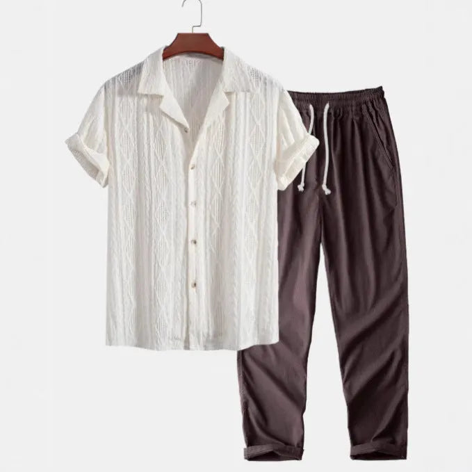 Men's casual camouflage print cardigan suit with short sleeve shirt and trousers on a hanger.