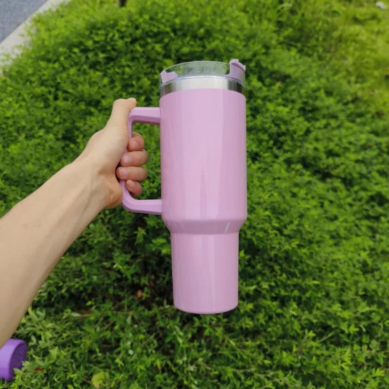 Large stainless steel vacuum insulated cup in a gradient colour option showing its height and simple style.