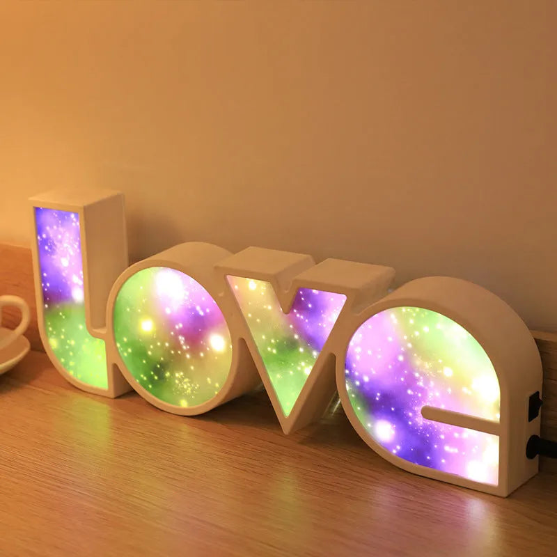 Rainbow style LED LOVE light decoration with plastic shell measuring 35.5cm by 13.5cm
