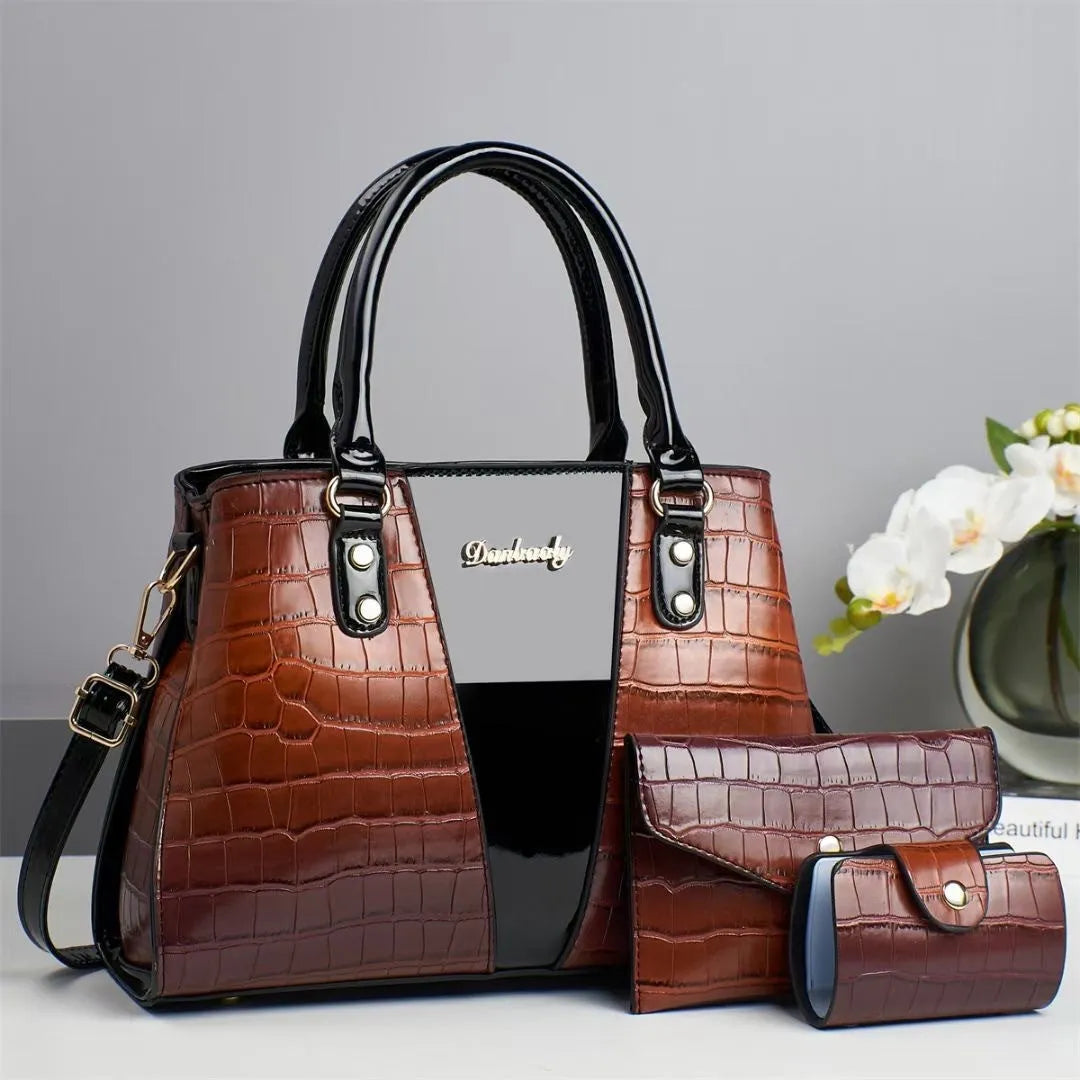 Women's crocodile stitch three-piece shoulder bag set in PU leather showing main bag, small bag, and card pouch