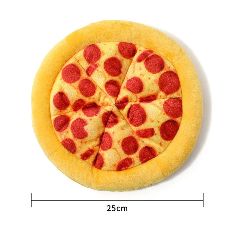 Yellow pizza slice shaped rubber dog chew toy with textured ridges and a squeaker.