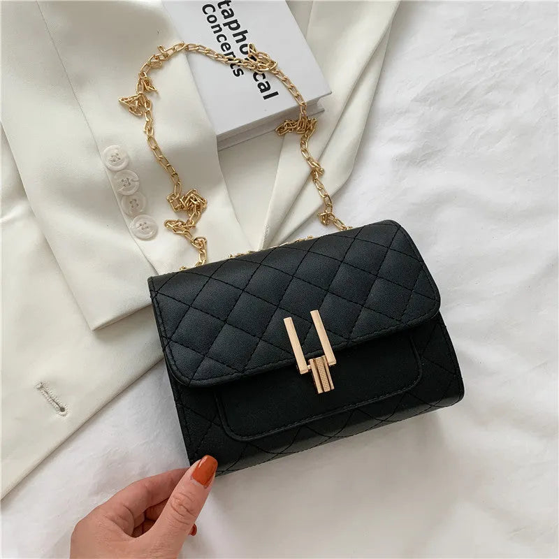 Women's PU crossbody bag with diamond lattice chain strap in minimalist solid colour design