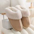 Women's winter plush slippers with round toe design in brown colour showing stitching detail