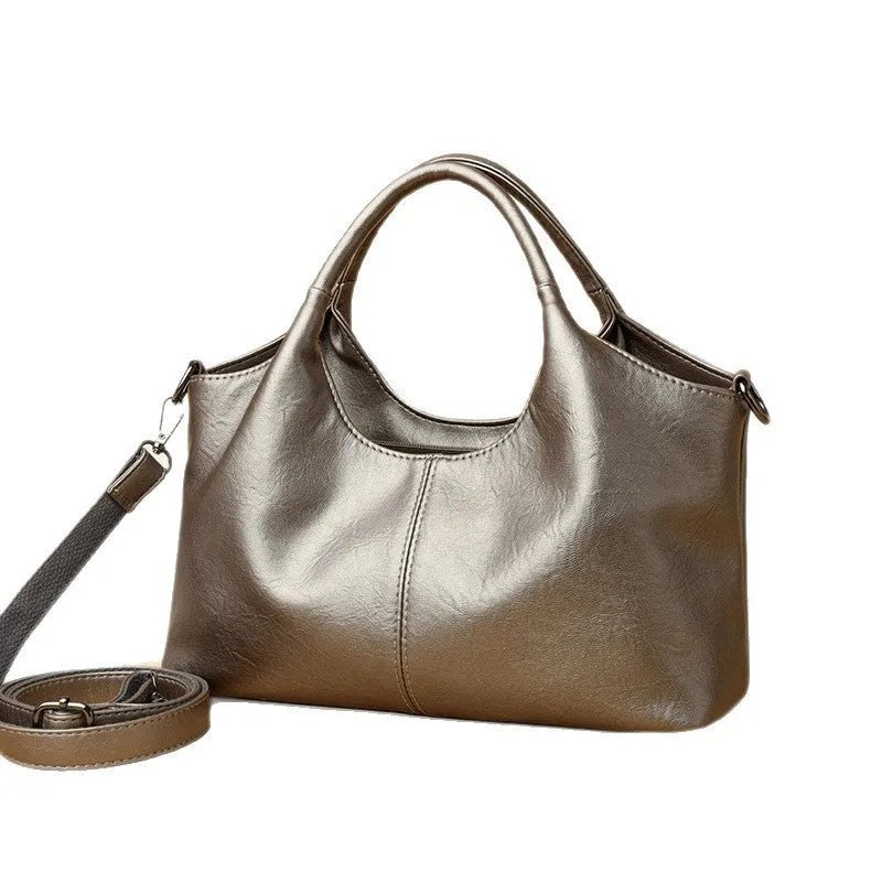 Genuine leather women's cross-body bag in a choice of seven colours including black, brown, and wine red