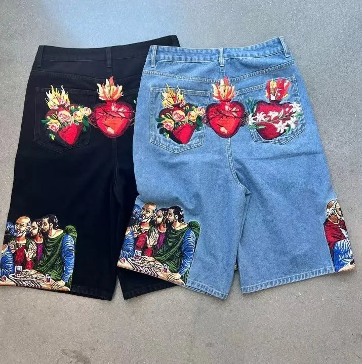 Men's blue cotton shorts with Jesus printed design on back pocket showing tapered fit