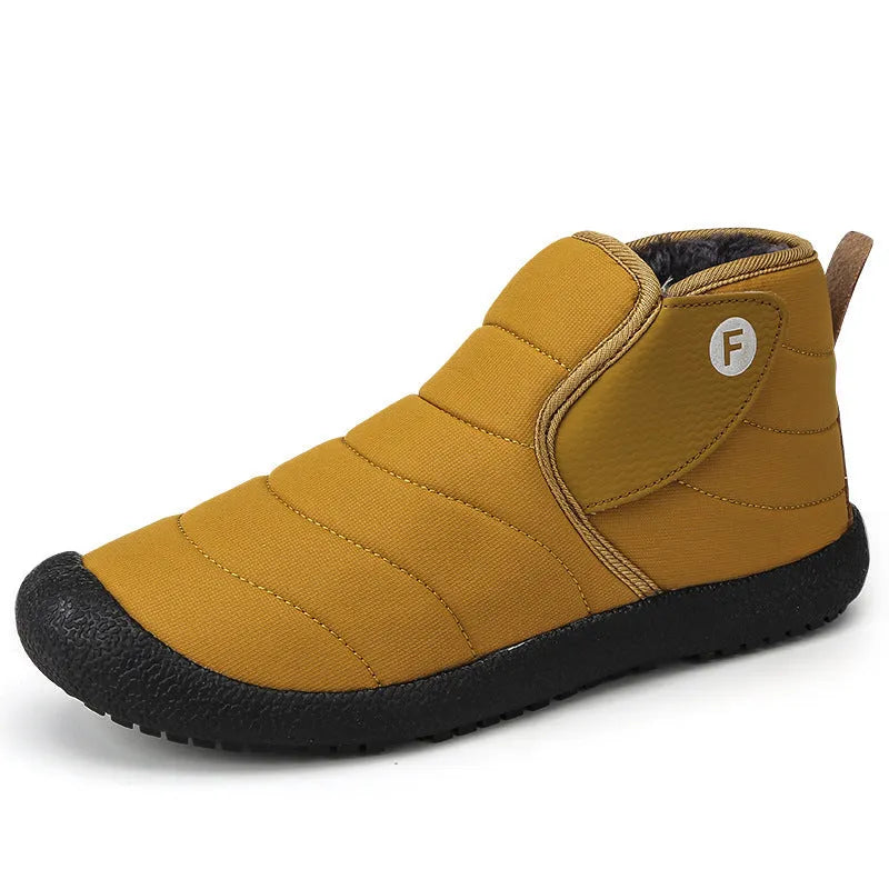 Men's waterproof snow boots in black with thick cotton upper and rubber sole.