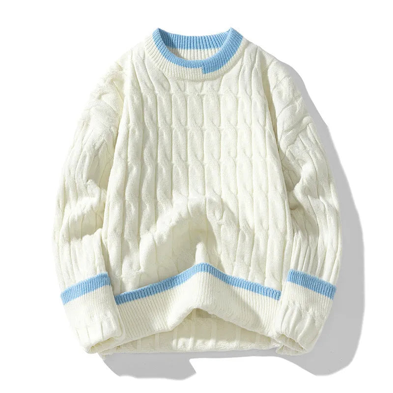 Man wearing a loose-fit long sleeve modal sweater in light blue, part of a two-piece set.