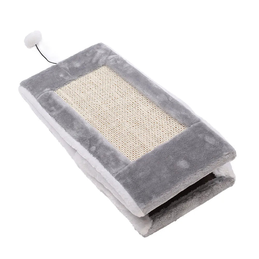 Grey and white triangle-shaped cat scratching post with an integrated fleece fabric bed.