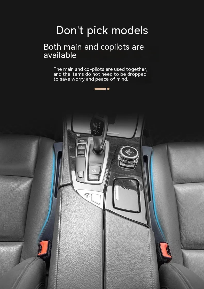 Black car gap storage box with handle positioned between car seats