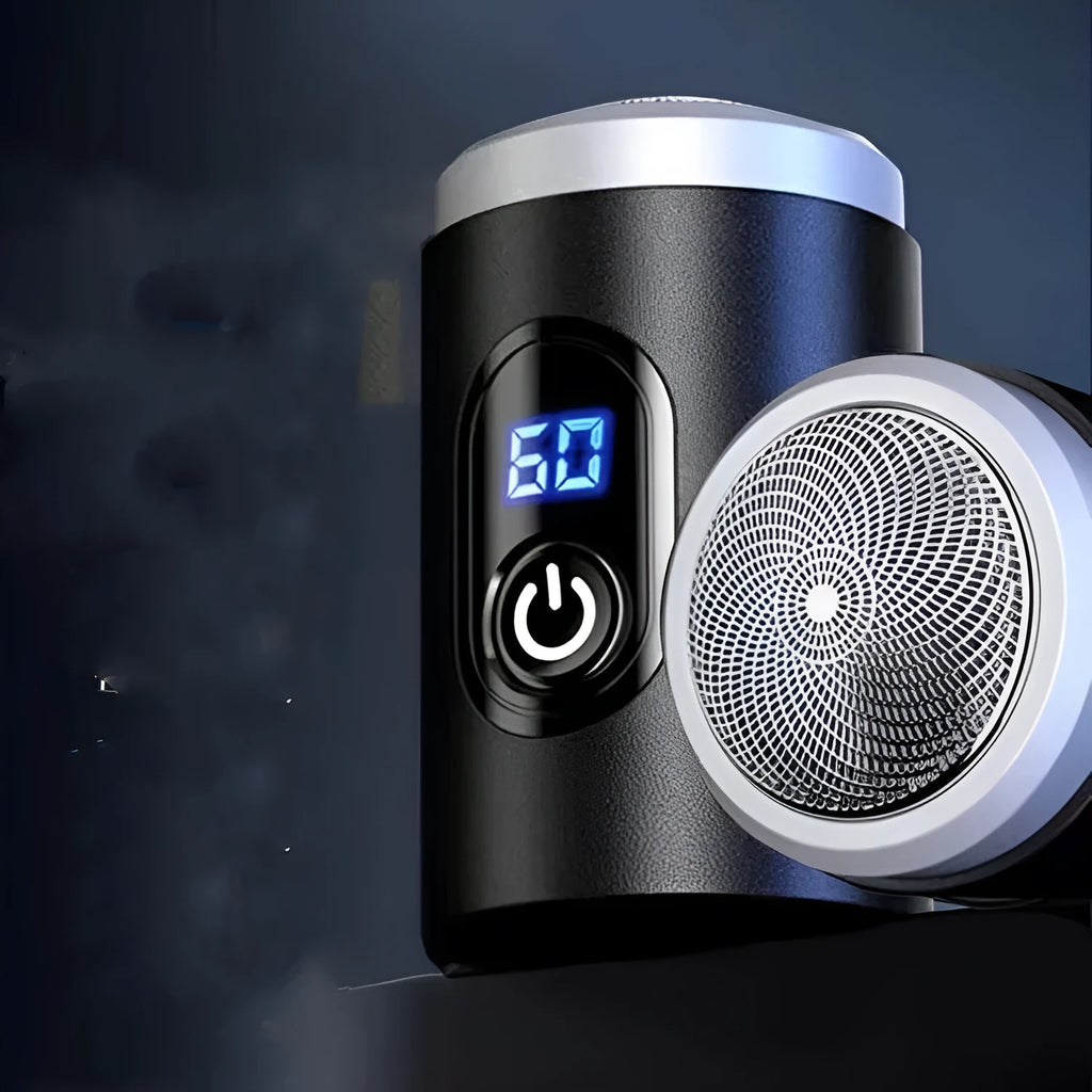 Black mini portable USB rechargeable electric shaver with cleaning brush and cable.