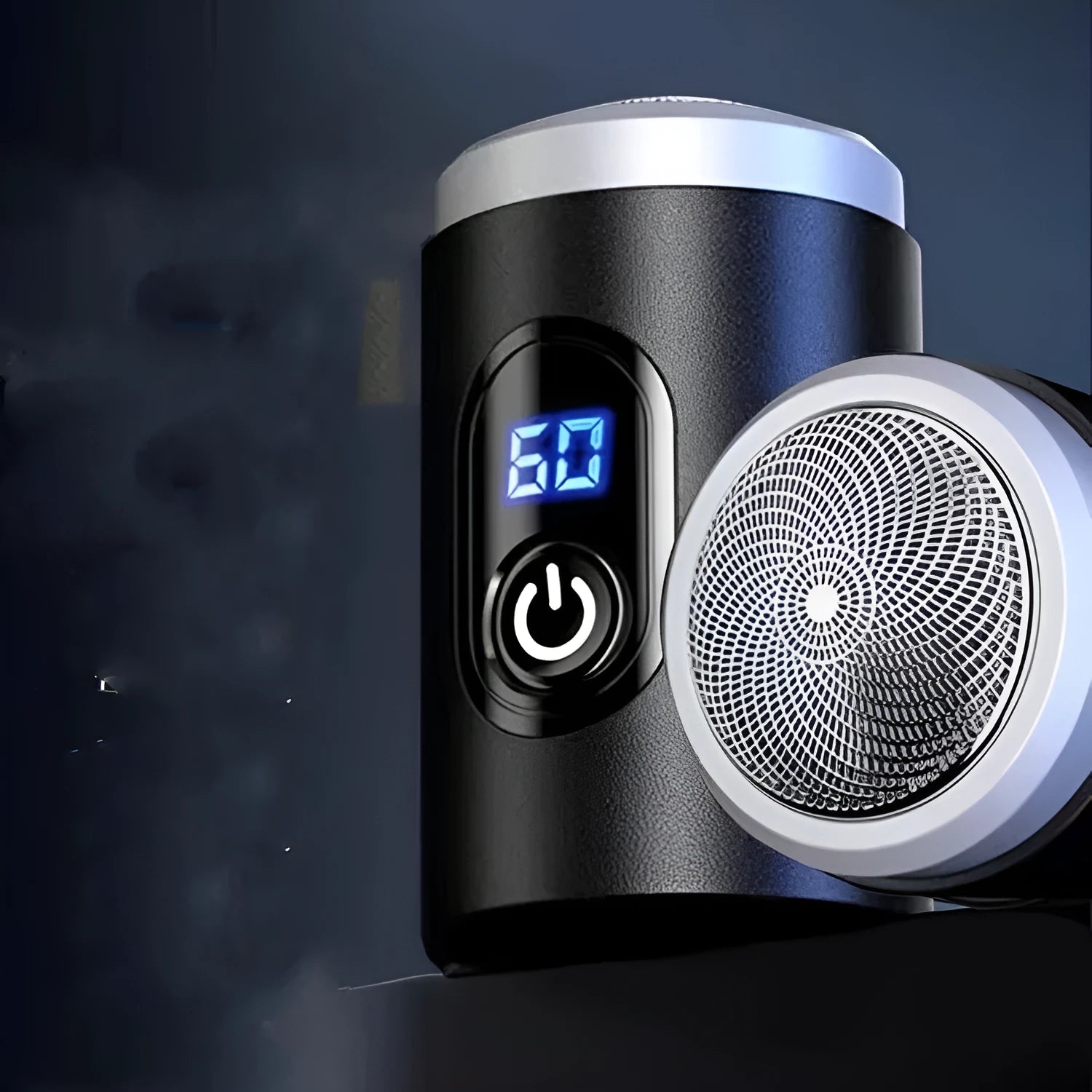 Black mini portable USB rechargeable electric shaver with cleaning brush and cable.
