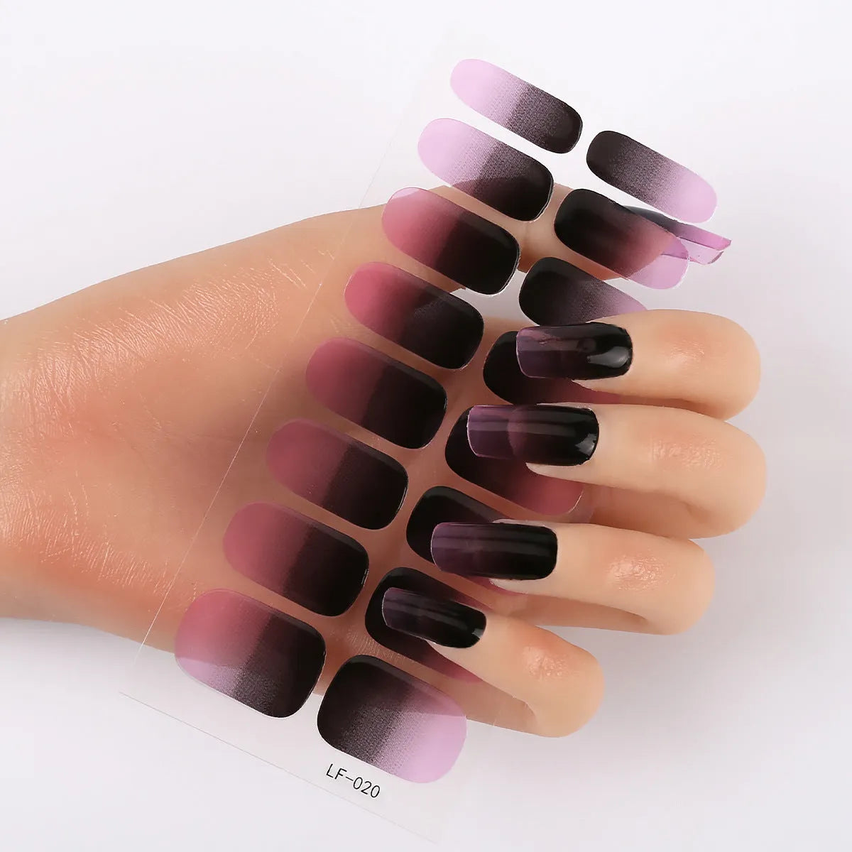 Sheet of 16 solid colour nail art sticker designs including cross, rose, and leopard print patterns.