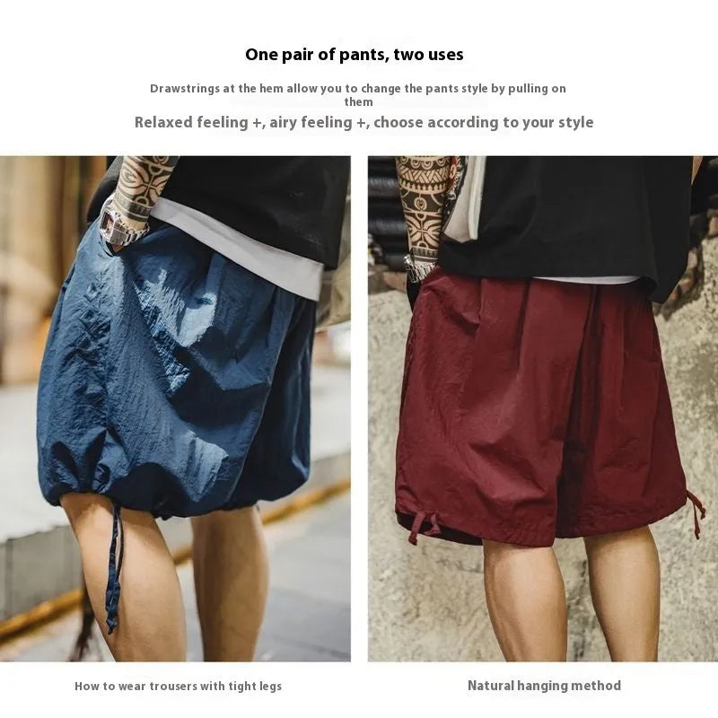 Men's loose fit Prussian Blue nylon shorts with embroidered design on leg, summer beach casual wear
