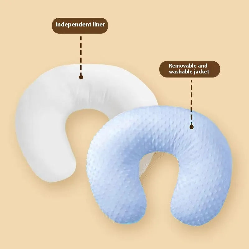 Grey nursing pillow with removable pillowcase for breastfeeding support and milk spill prevention