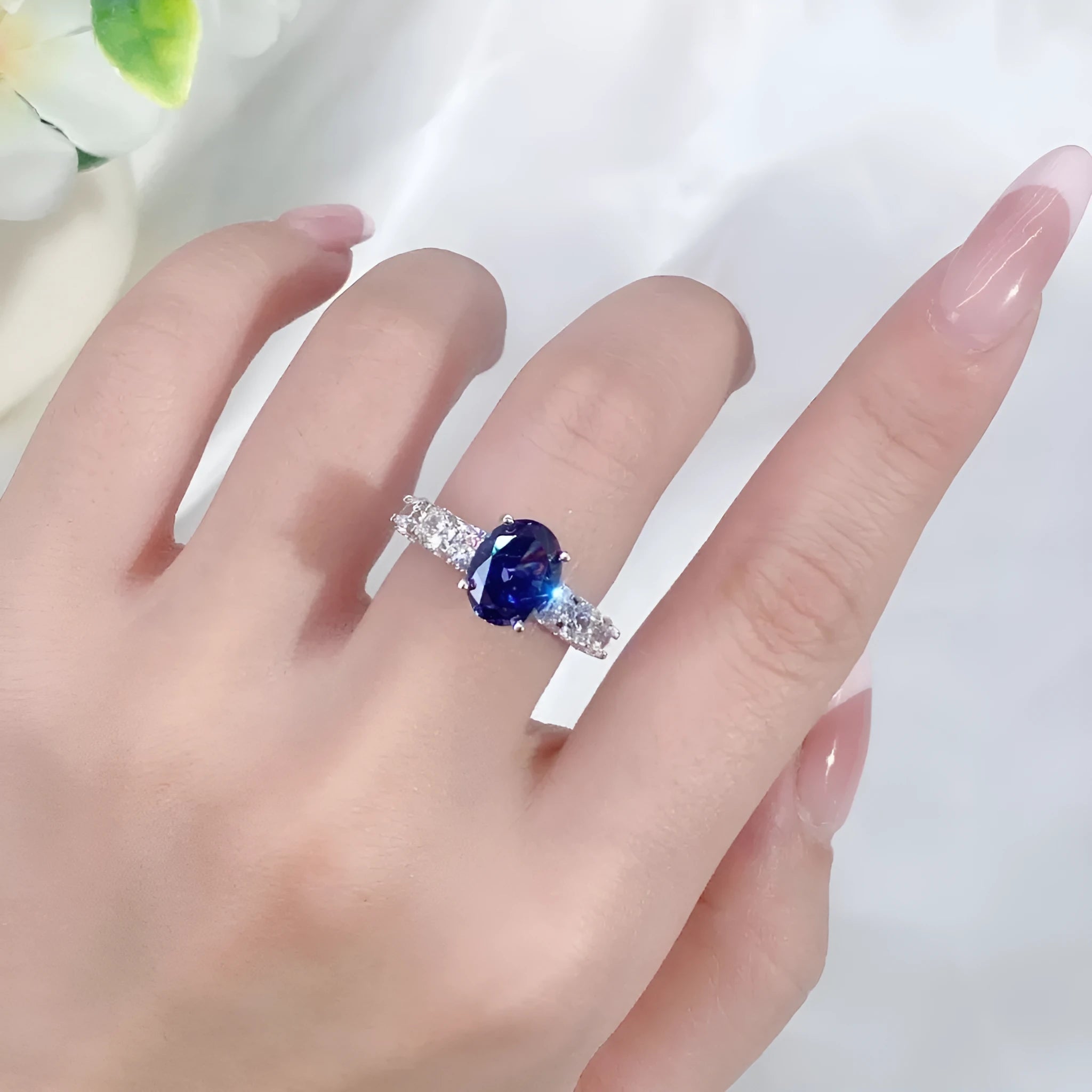 Heart-shaped Tan Sang zircon stone with ice flower diamond cut in a sterling silver ring band.