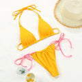 Women's polka dot print split swimsuit bikini with triangle bottom and matching bra