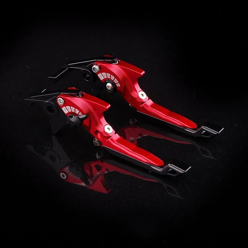 Pair of anodised metal motorcycle brake and clutch levers with adjustable length mechanism