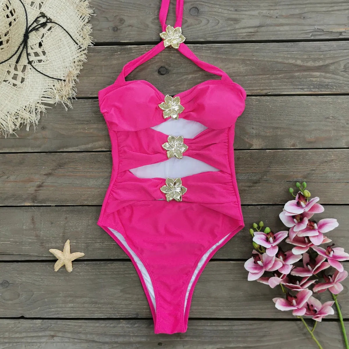 Women's black one-piece swimsuit with matching skirt and hollow-out tube top design