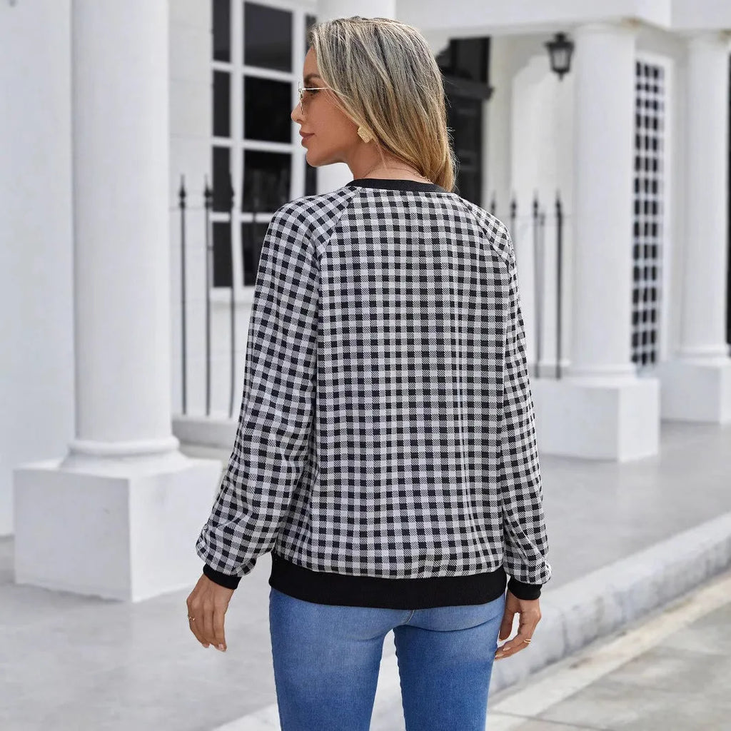 Black Japanese plaid pattern pullover sweater with long sleeves and stripe detailing