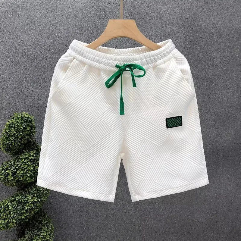 Men's casual sports shorts in polyester micro-elastic fabric available in white, black, or green
