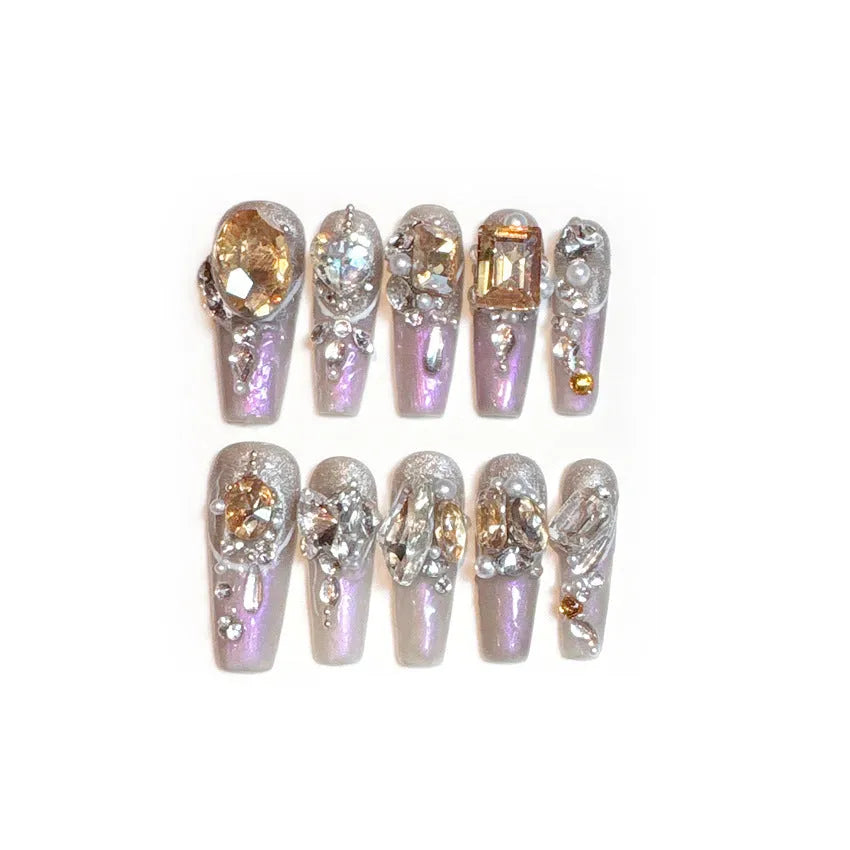 Rhinestone-decorated press-on false nails displayed on card paper packaging with size S classification