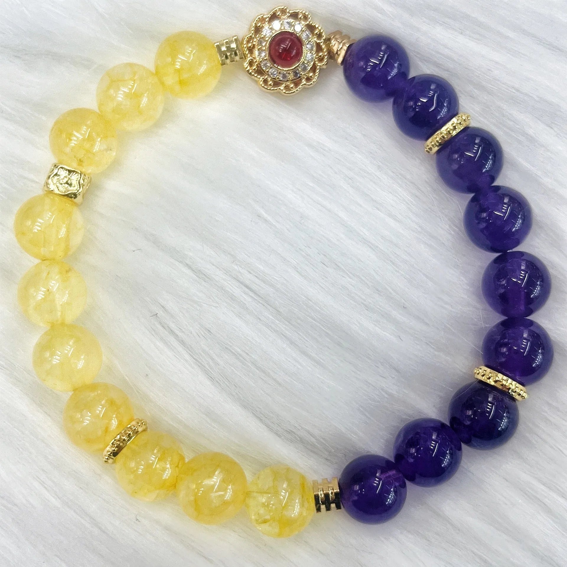 Handmade women's crystal bracelet with yellow and purple amethyst stones