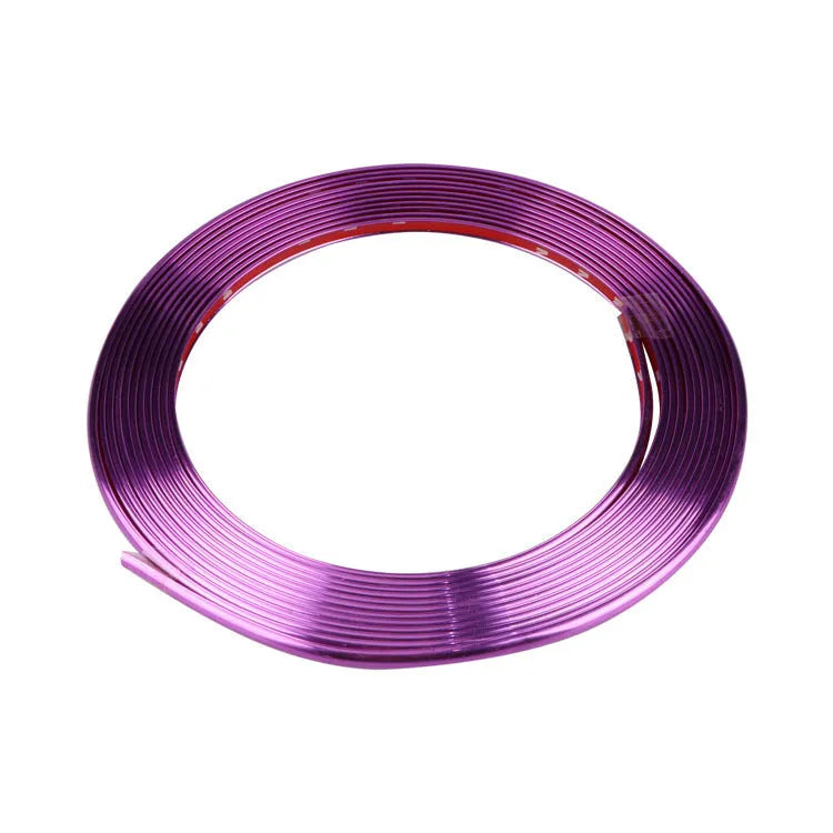 Roll of electroplated purple PVC wheel hub trim strip, 8 metres long, for car decoration and protection.