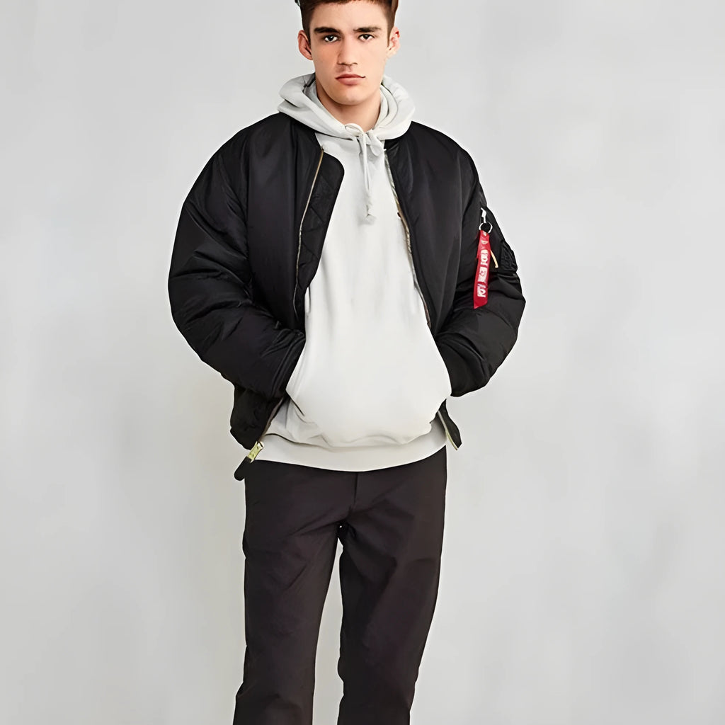 Men's loose fit pilot jacket in army green, showing cotton padding and double-sided nylon construction.