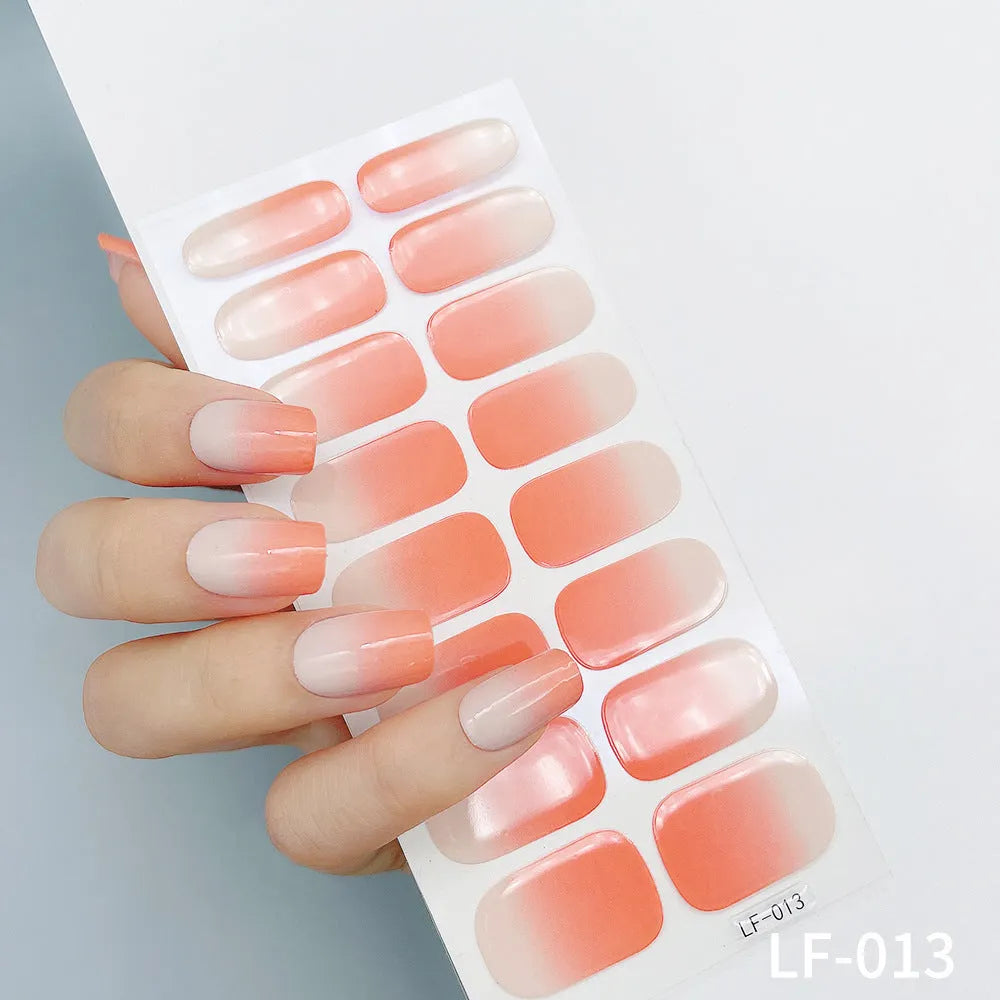 Sheet of 16 solid colour nail art sticker designs including cross, rose, and leopard print patterns.