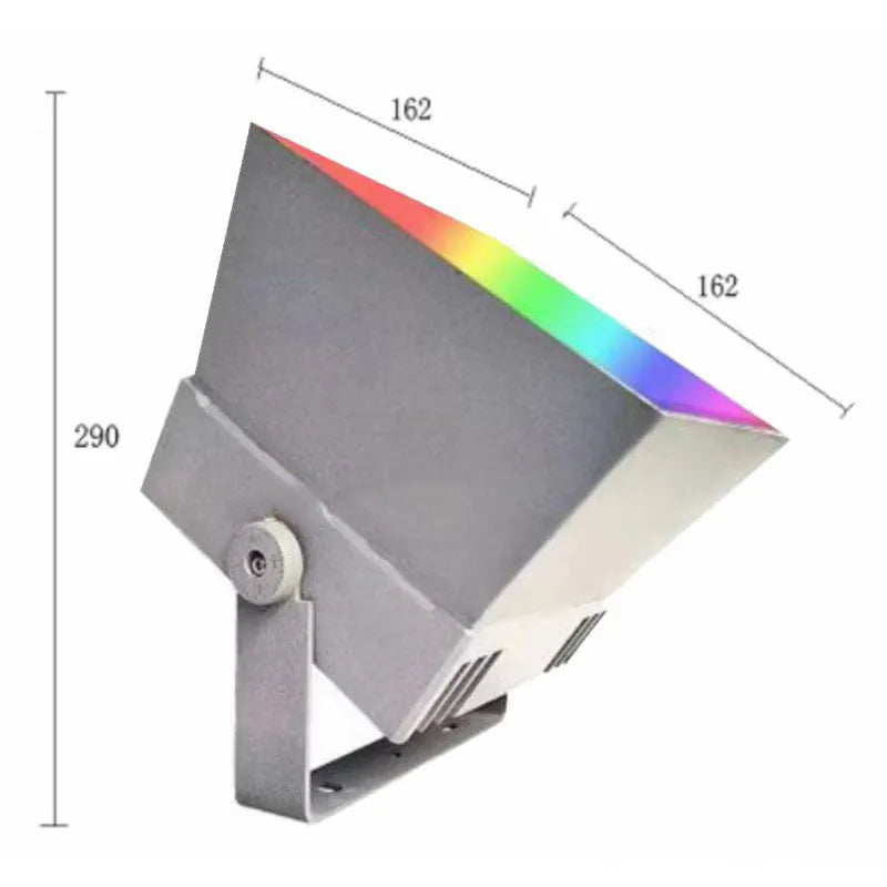 Silver aluminium outdoor LED spotlight projecting multi-coloured light onto trees.
