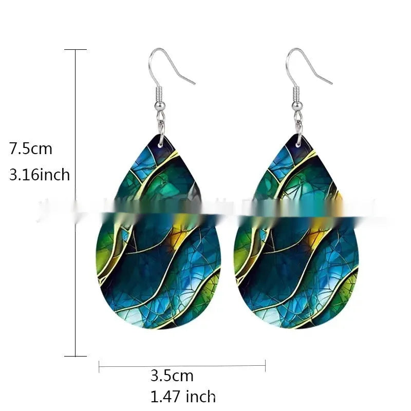 Pair of flat acrylic drop earrings with printed branch knot design in unisex style