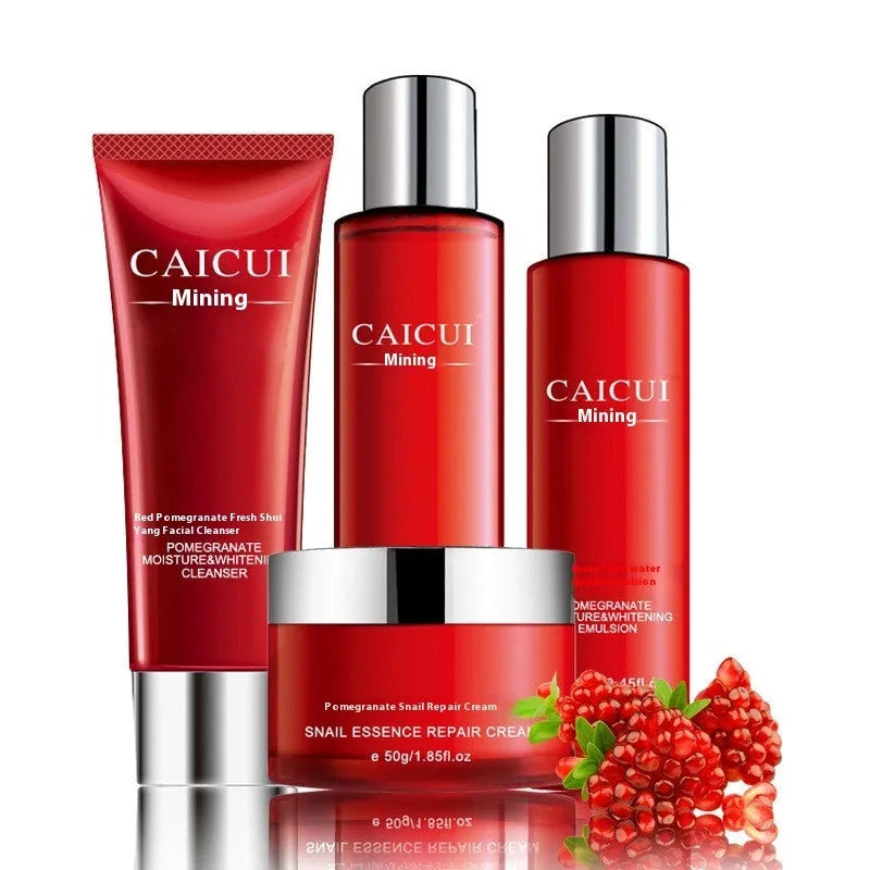 Red packaged pomegranate skincare set containing face wash, toner, lotion, and facial cream bottles.