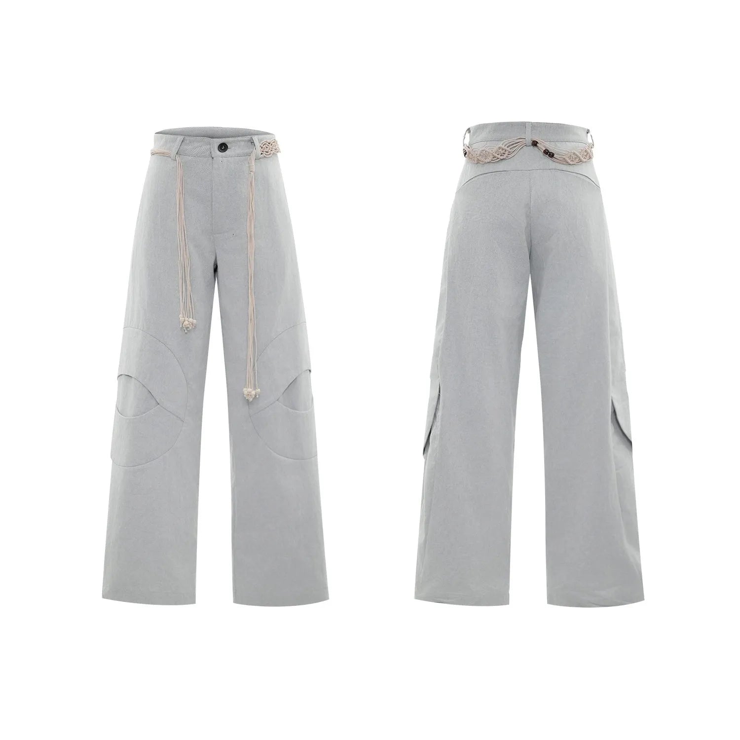 Men's dark blue straight-leg jeans with heavy 3D cutting, showing zipper decoration and tassel detail on a loose fit.