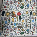 Colourful cartoon animal print nylon cosmetic bag shown in large, medium, and small sizes.