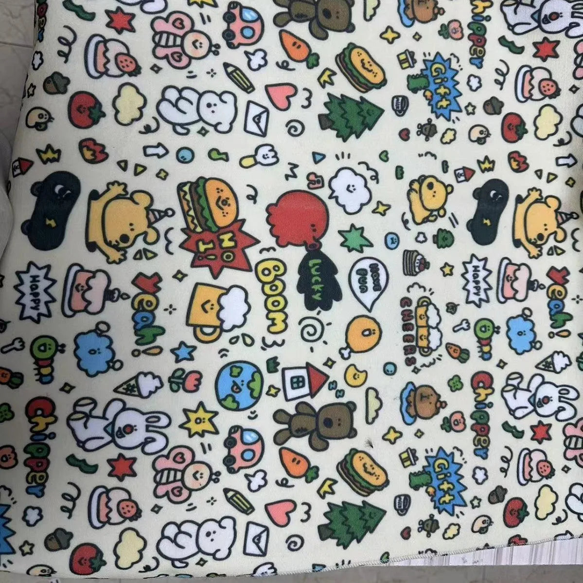 Colourful cartoon animal print nylon cosmetic bag shown in large, medium, and small sizes.