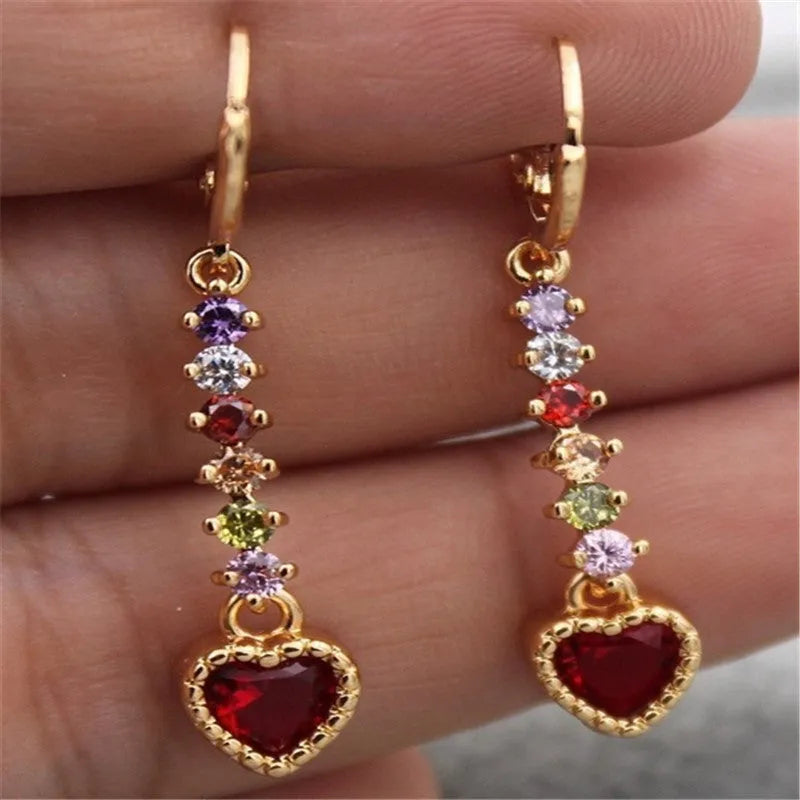 Heart-shaped women's earrings with metallic electroplated finish in gold or silver tone options