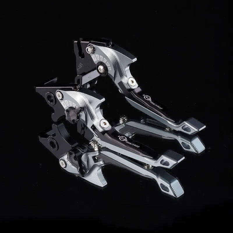 Pair of anodised metal motorcycle brake and clutch levers with adjustable length mechanism
