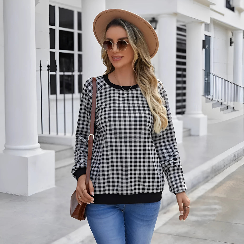 Black Japanese plaid pattern pullover sweater with long sleeves and stripe detailing