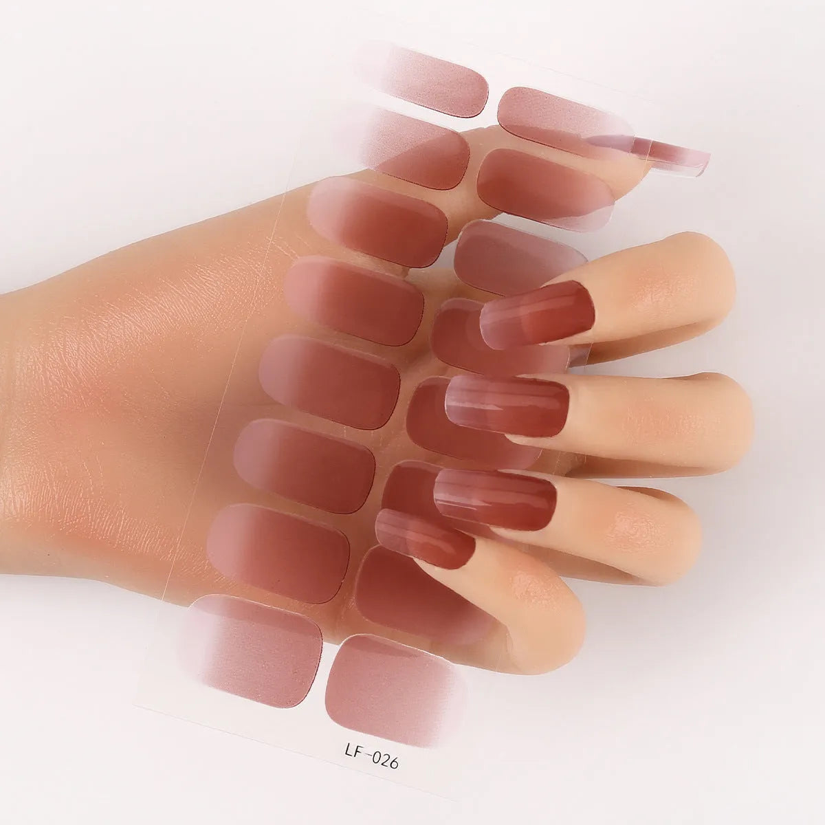Sheet of 16 solid colour nail art sticker designs including cross, rose, and leopard print patterns.