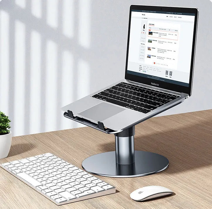 Silver adjustable car laptop stand with height settings and rotating base on a car seat.
